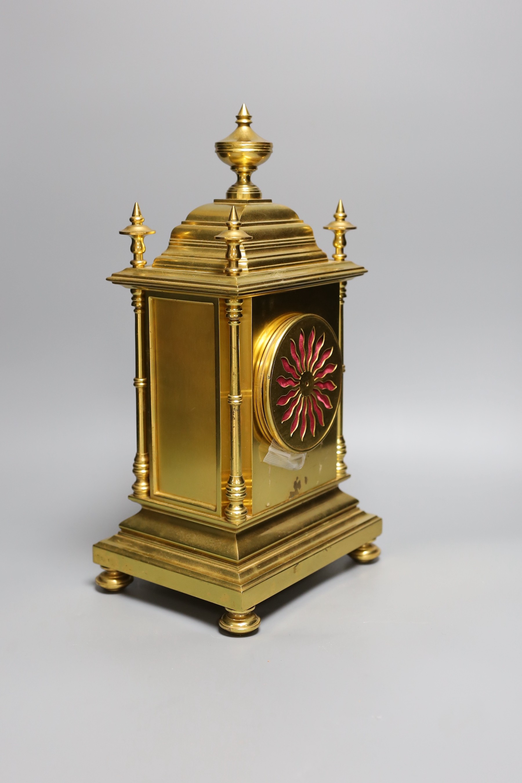 A Le Roy et Fils architectural brass mantel clock, with pendulum and key, 37cm tall